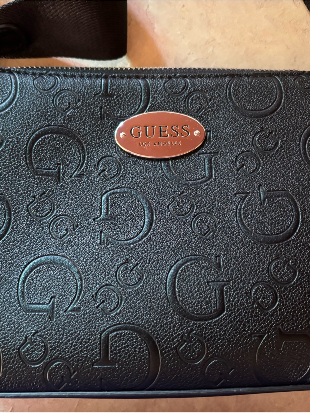 Guess Embossed Logo Black Crossbody with Gold Plaque